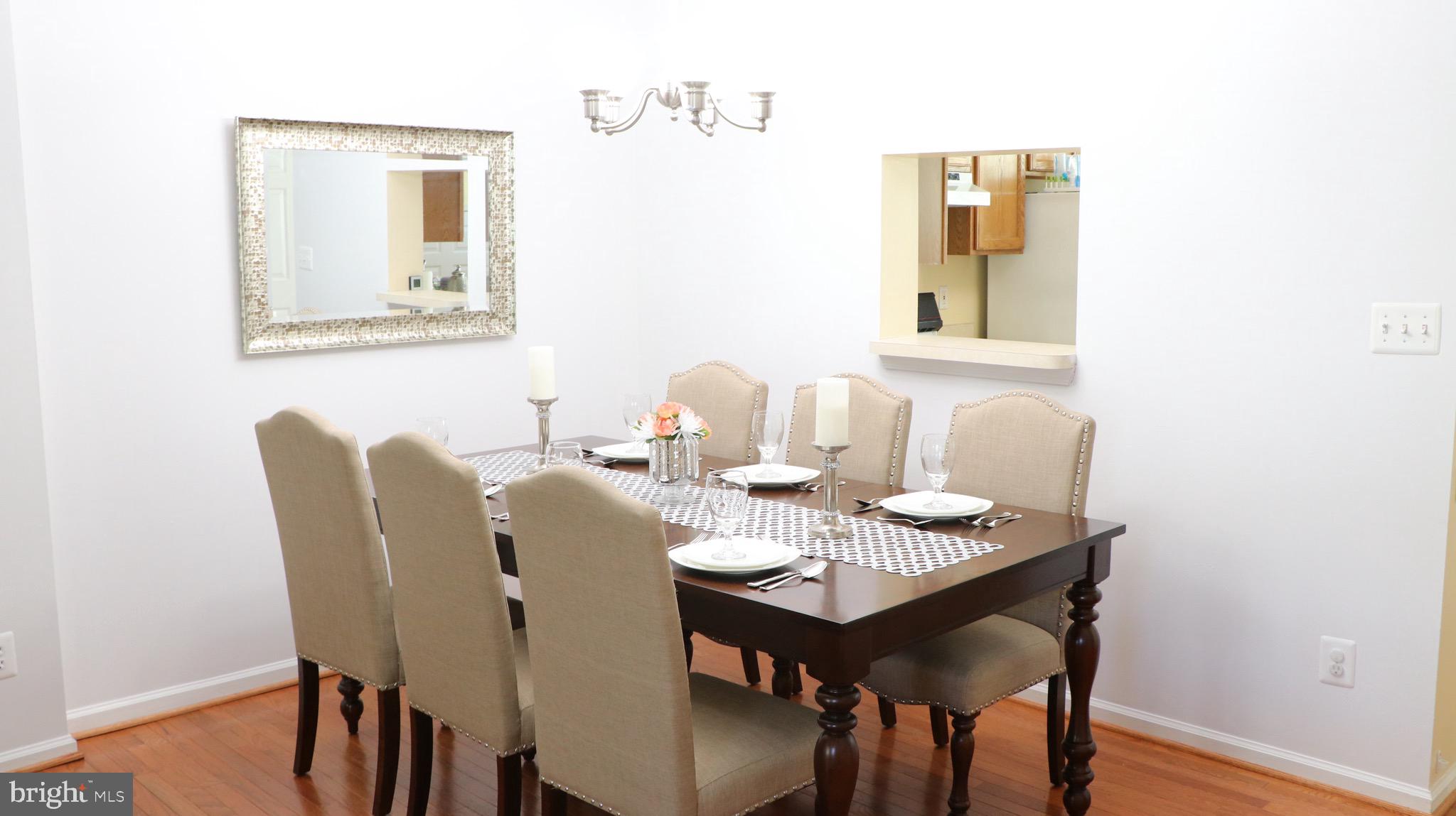 4048 Jasper Loop Dumfries, VA 22025 - Photo 10 of 29 Dining room - note pass-thru to kitchen