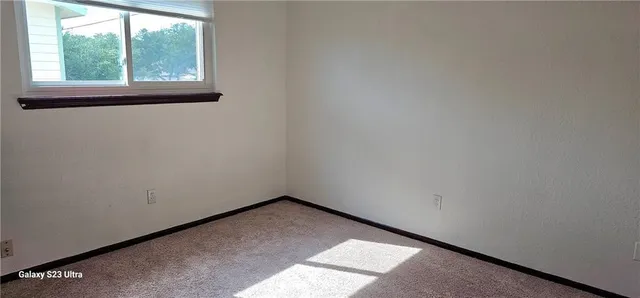 a view of a small space with window