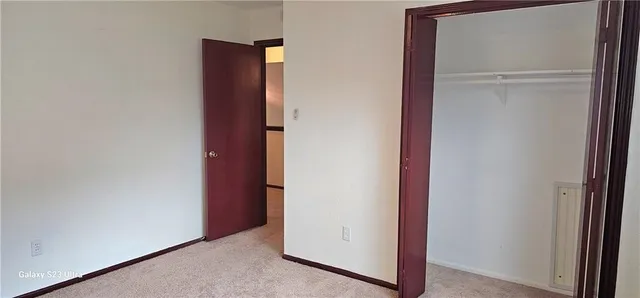 a view of hallway with closet