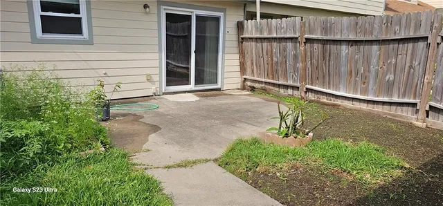 a backyard of a house with lots of green space
