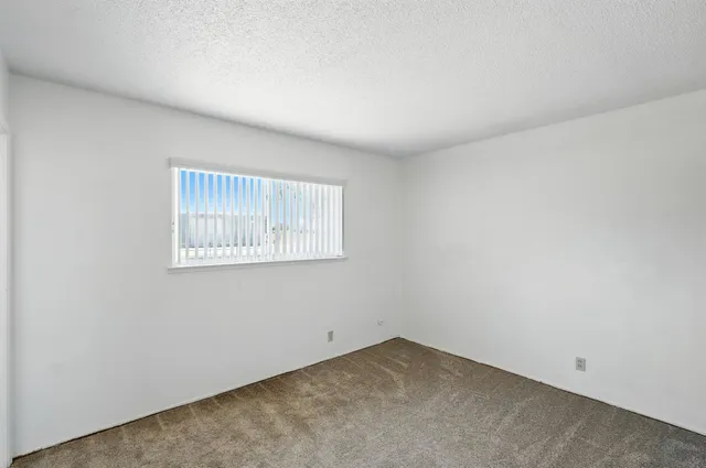 a view of an empty room with window