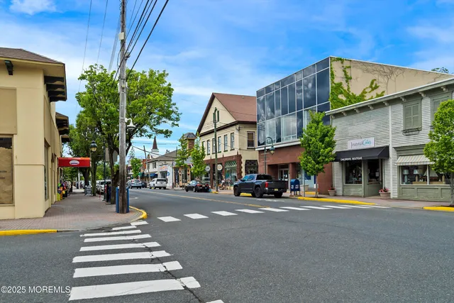 a view of a street with sitting area