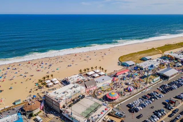 an aerial view of beach and ocean