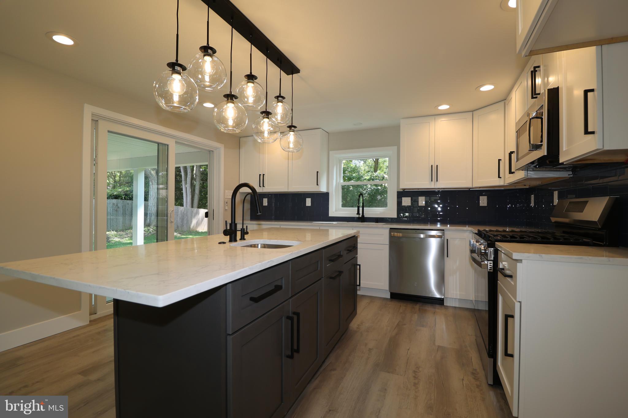 610 Burton Road Oreland, PA 19075 - Photo 20 of 77 Kitchen with Quartz Countertops