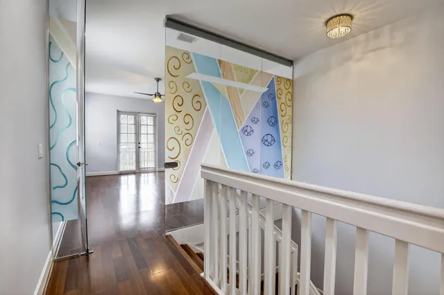 a view of entryway with wooden floor