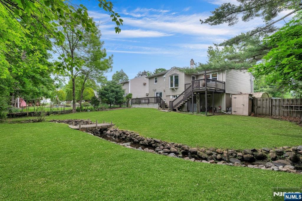 185 Ratzer Road Wayne, NJ 07470 - Photo 34 of 36 a view of a house with a back yard