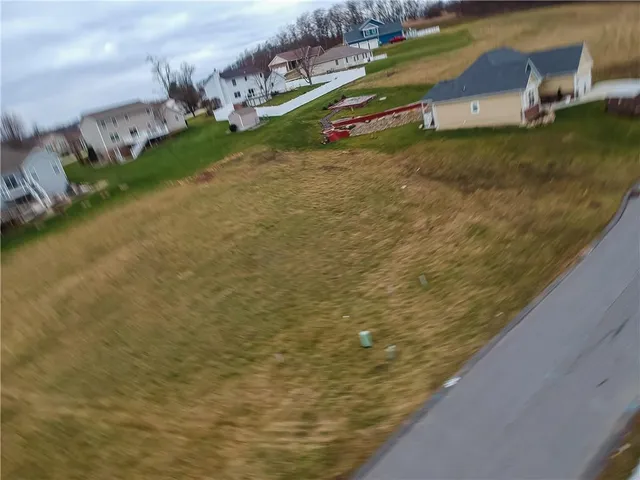 a view of a houses with a yard