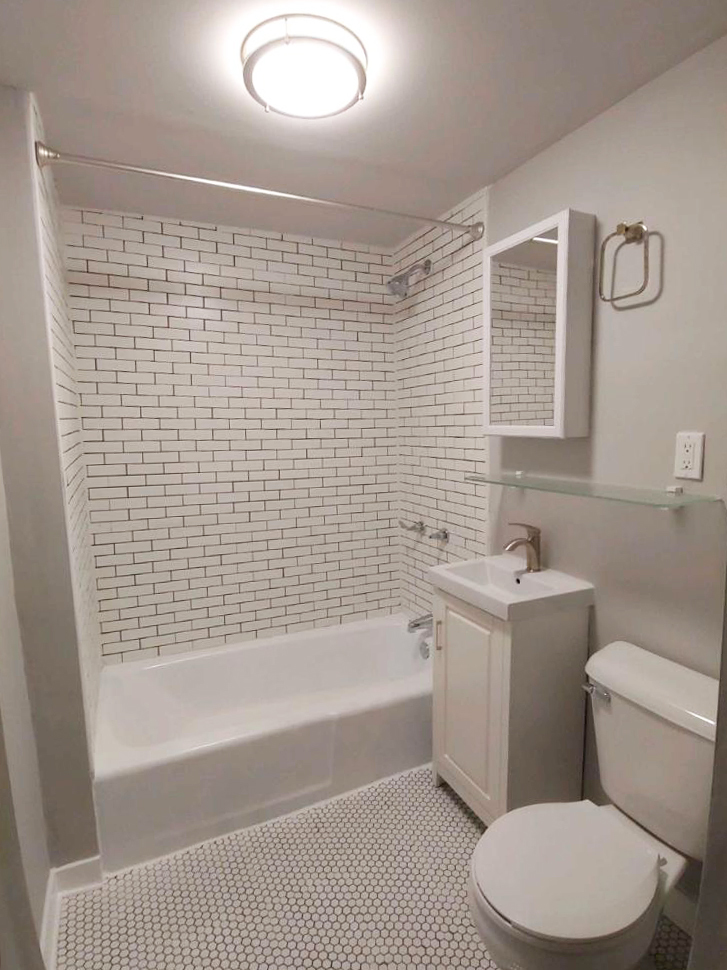 2655 West 24th Place Chicago, IL 60608 - Photo 3 of 16 a bathroom with a sink a toilet and bathtub