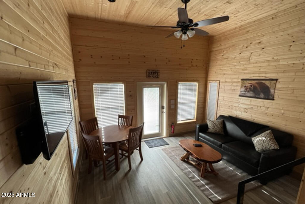 2746 Columbia Lane, Unit 10 Overgaard, AZ 85933 - Photo 11 of 33 a living room with furniture and a fireplace