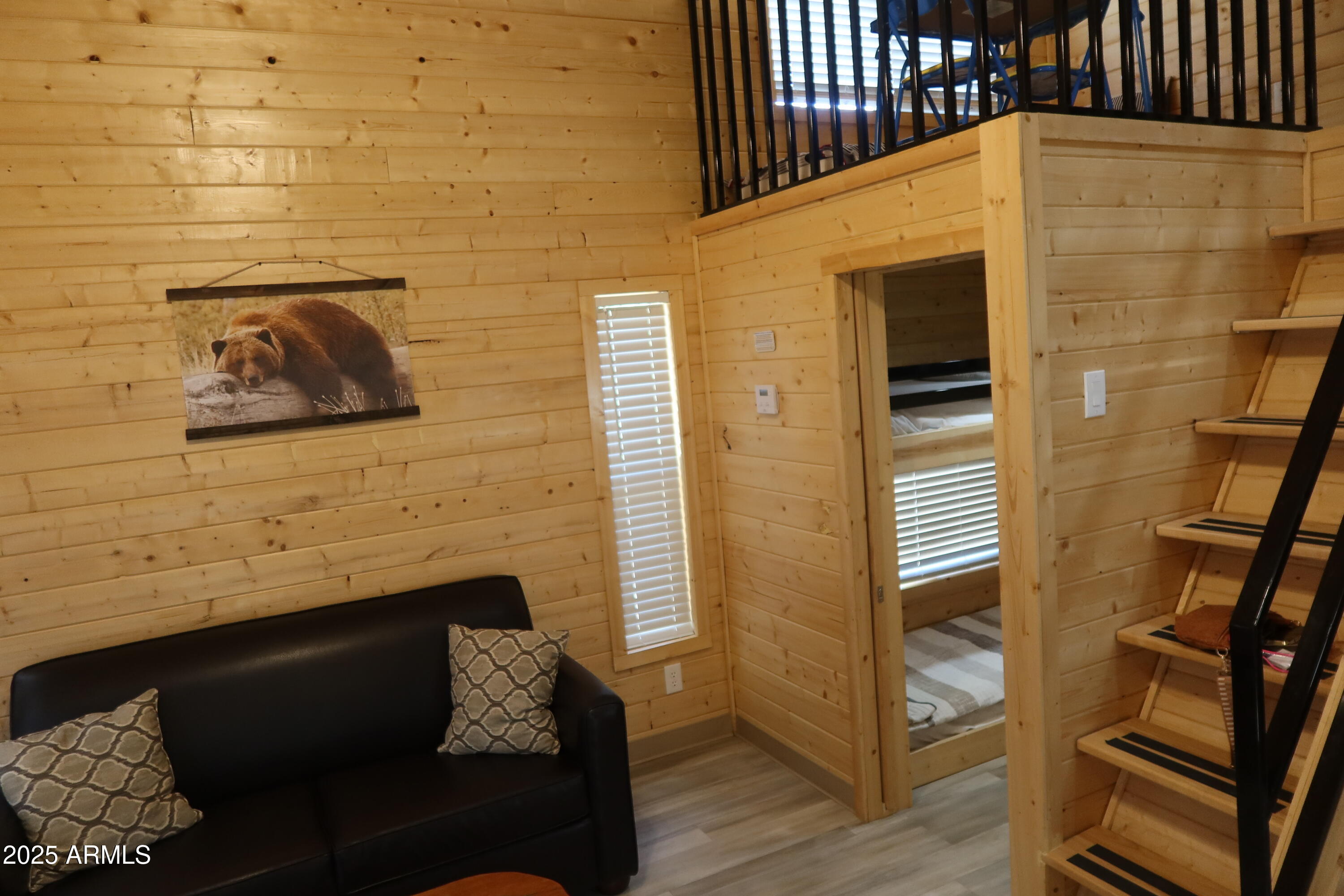 2746 Columbia Lane, Unit 10 Overgaard, AZ 85933 - Photo 12 of 33 a view of door and wooden floor
