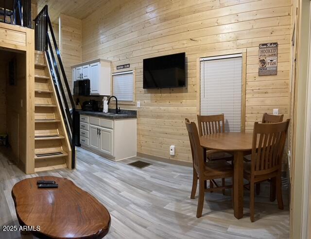 2746 Columbia Lane, Unit 10 Overgaard, AZ 85933 - Photo 13 of 33 a view of a dining room with furniture and wooden floor