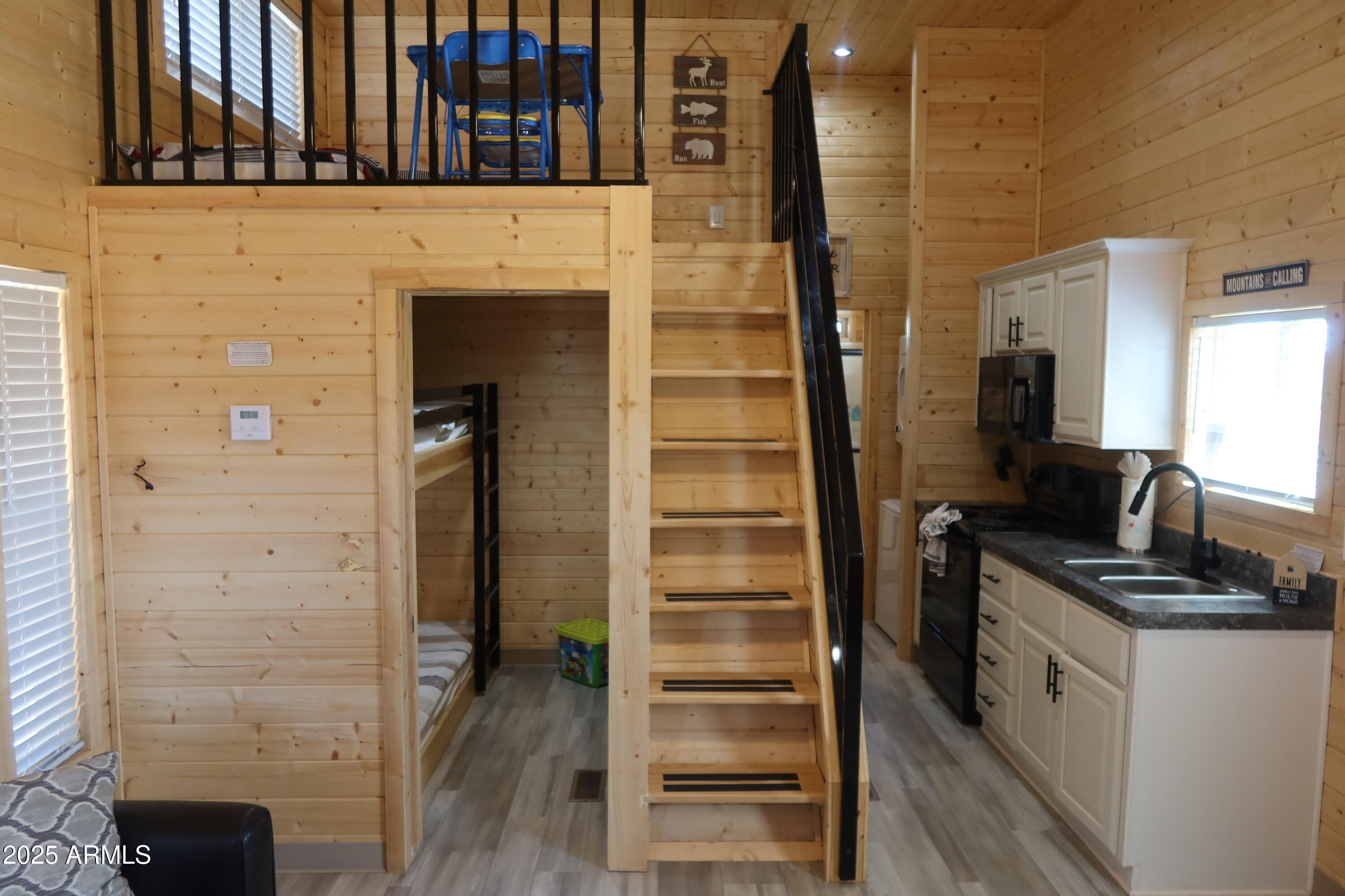 2746 Columbia Lane, Unit 10 Overgaard, AZ 85933 - Photo 14 of 33 a kitchen with a refrigerator and a stove