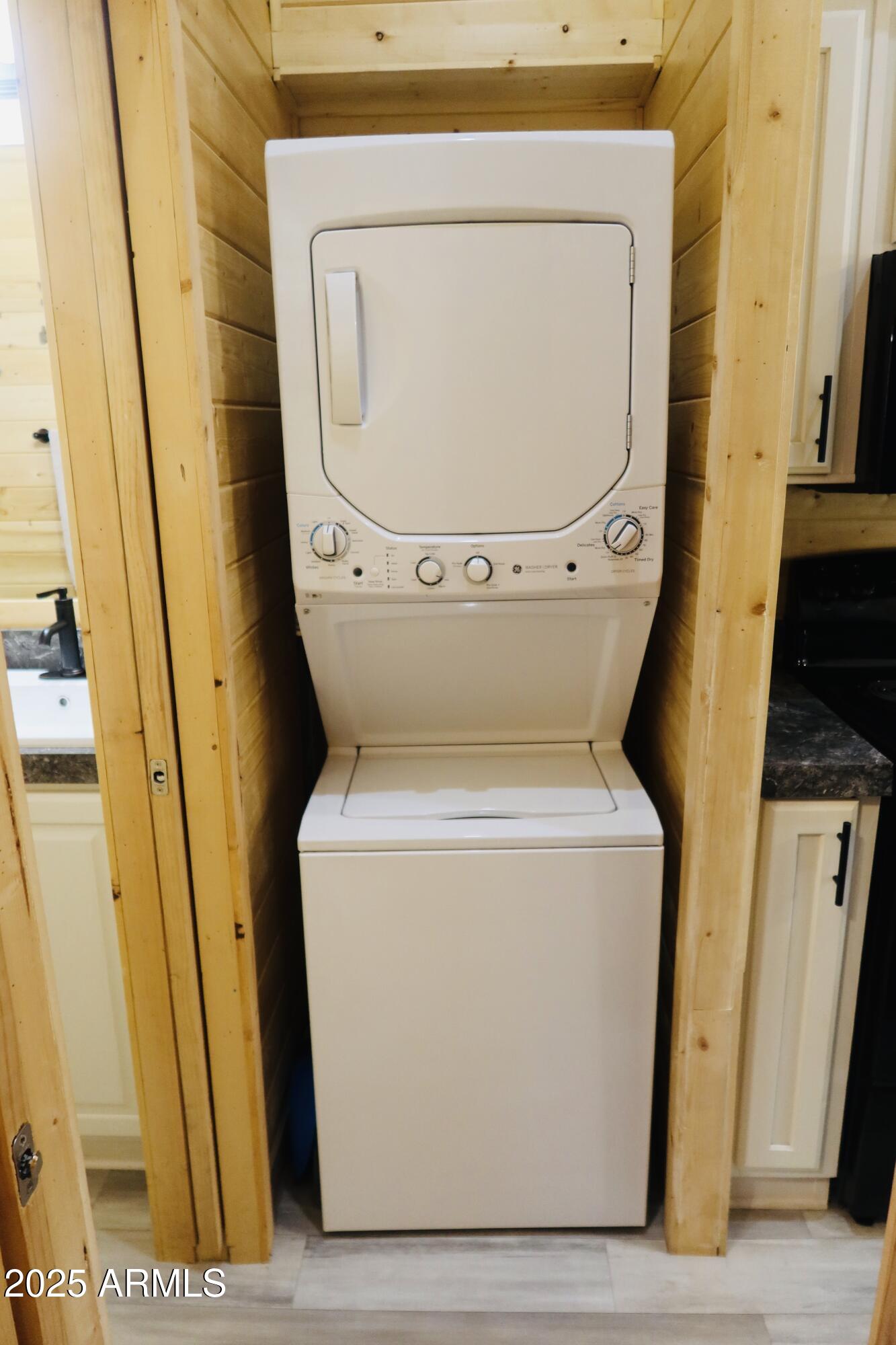 2746 Columbia Lane, Unit 10 Overgaard, AZ 85933 - Photo 27 of 33 a utility room with dryer and washer