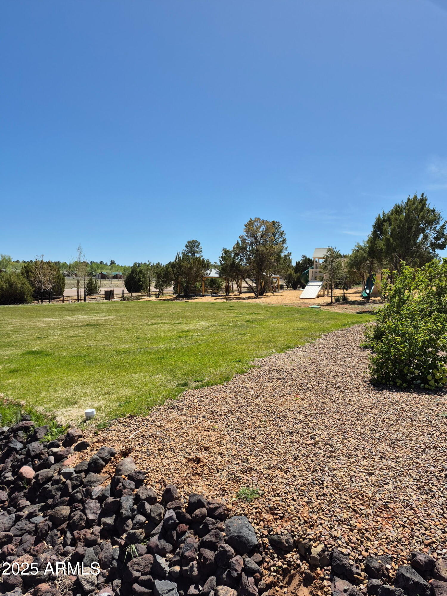 2746 Columbia Lane, Unit 10 Overgaard, AZ 85933 - Photo 33 of 33 a view of a ocean with a beach