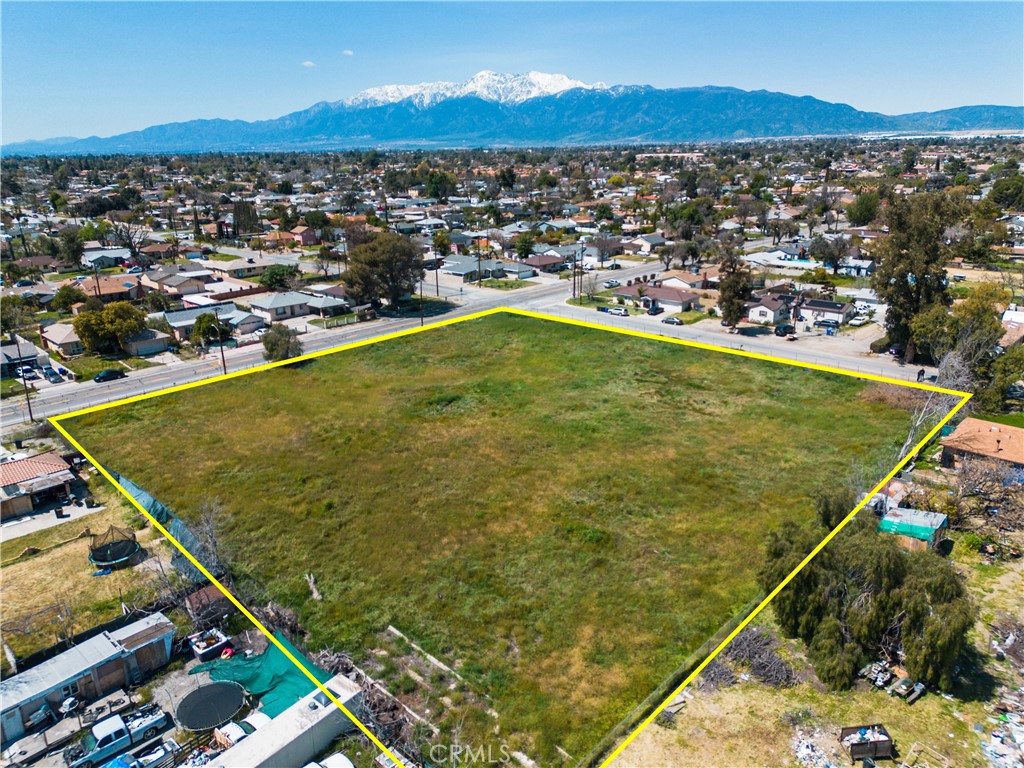 Aerial view of property with San Gabriel Mountains behind