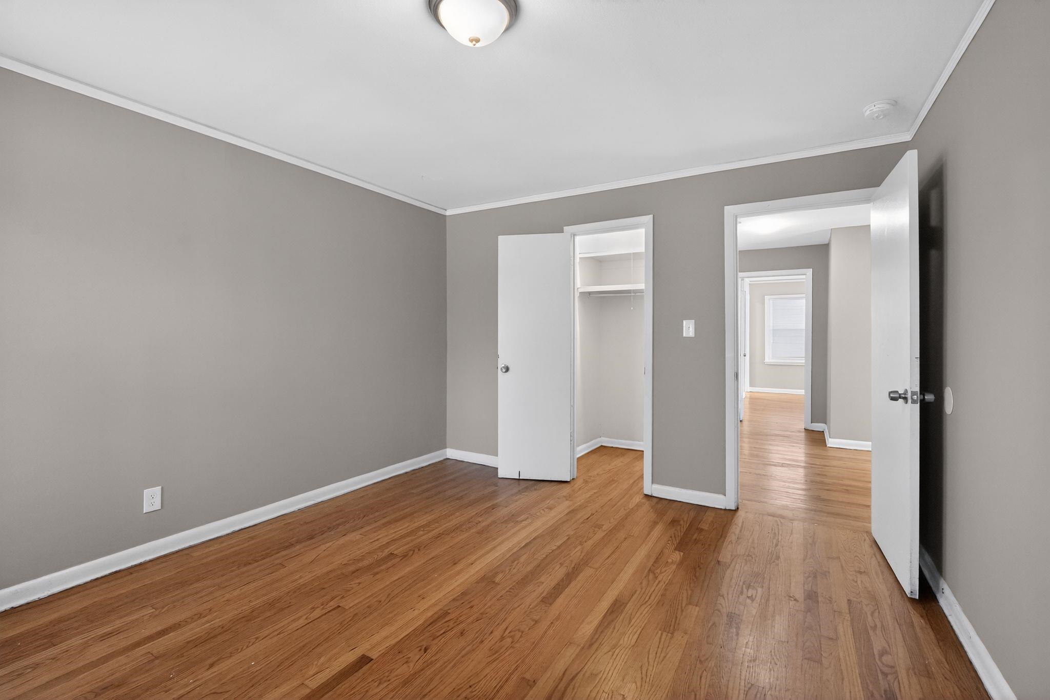 4094 Auburn Road Memphis, TN 38116 - Photo 15 of 30 wooden floor in an empty room with a window