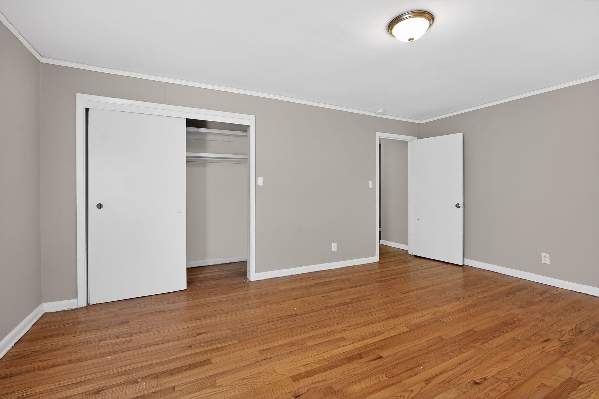 4094 Auburn Road Memphis, TN 38116 - Photo 16 of 30 a view of an empty room with wooden floor