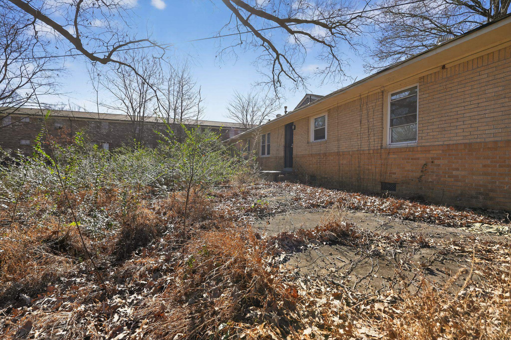 4094 Auburn Road Memphis, TN 38116 - Photo 23 of 30 a backyard of a house