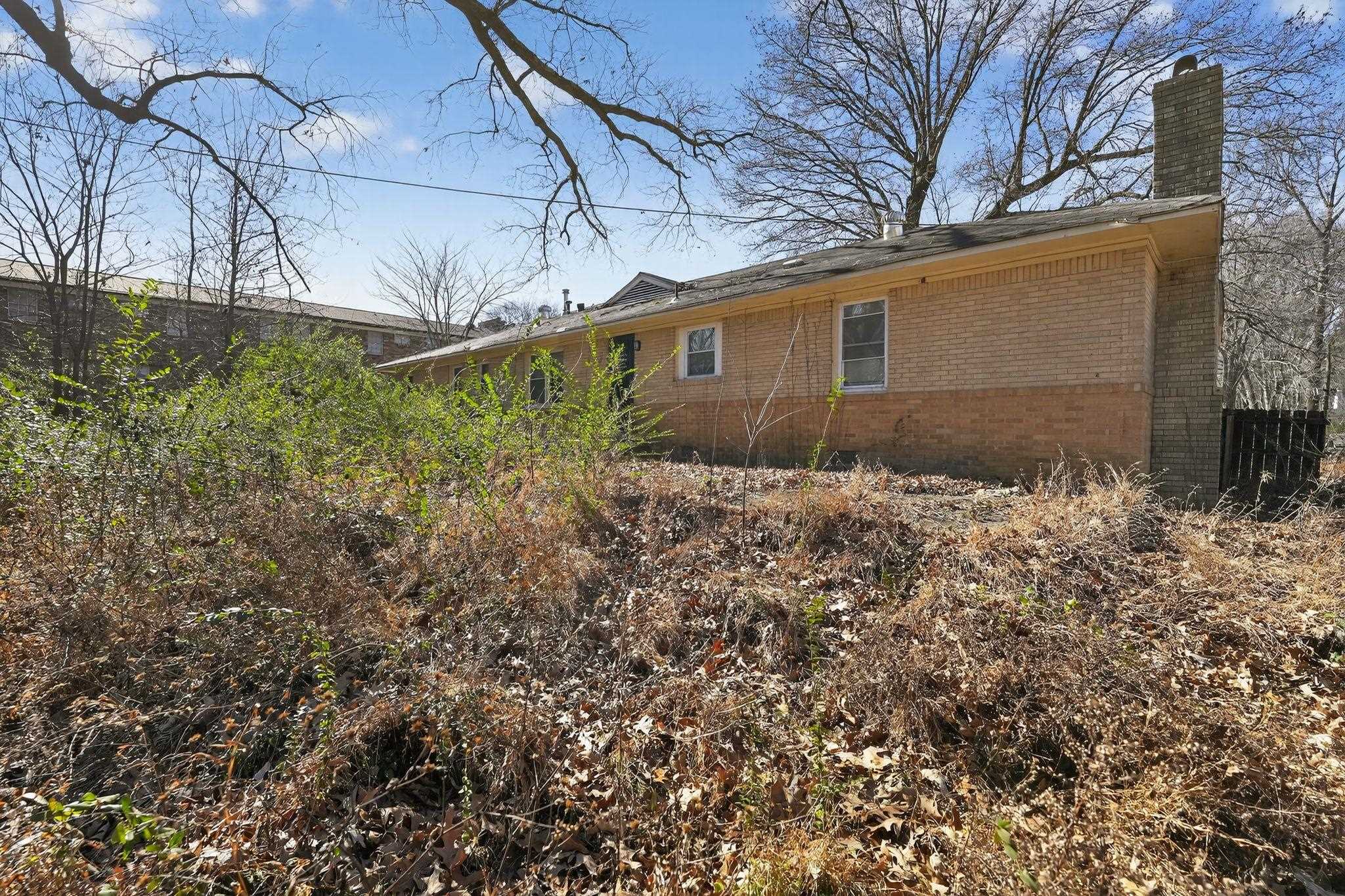 4094 Auburn Road Memphis, TN 38116 - Photo 27 of 30 a front view of a house with a yard
