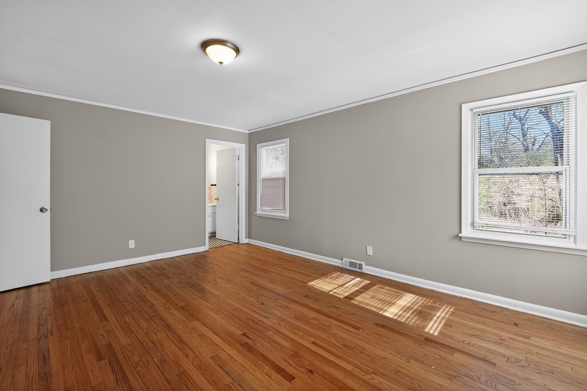 4094 Auburn Road Memphis, TN 38116 - Photo 8 of 30 a view of empty room with wooden floor and fan