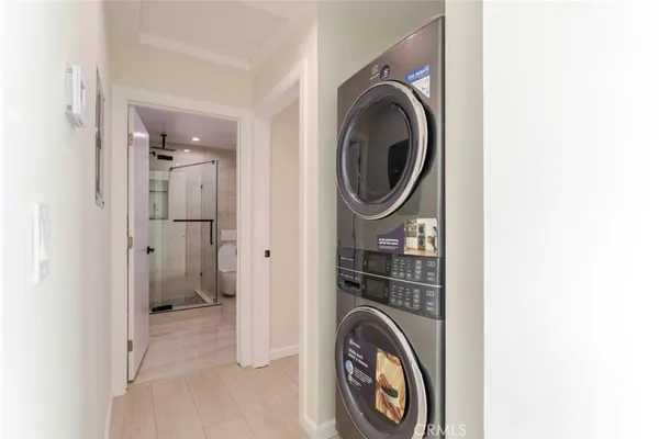 a view of a balcony with an outdoor seating