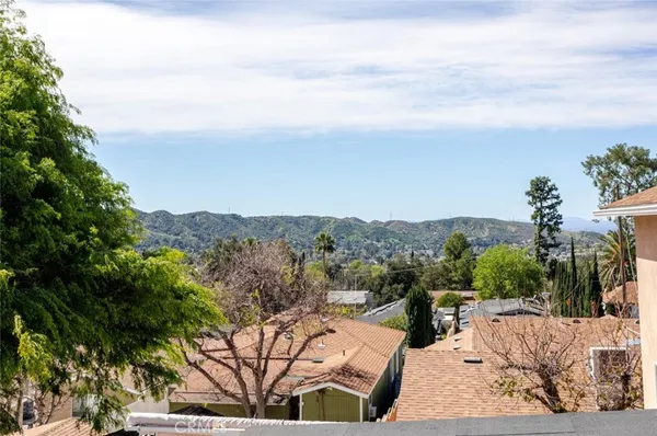 a view of city and mountain