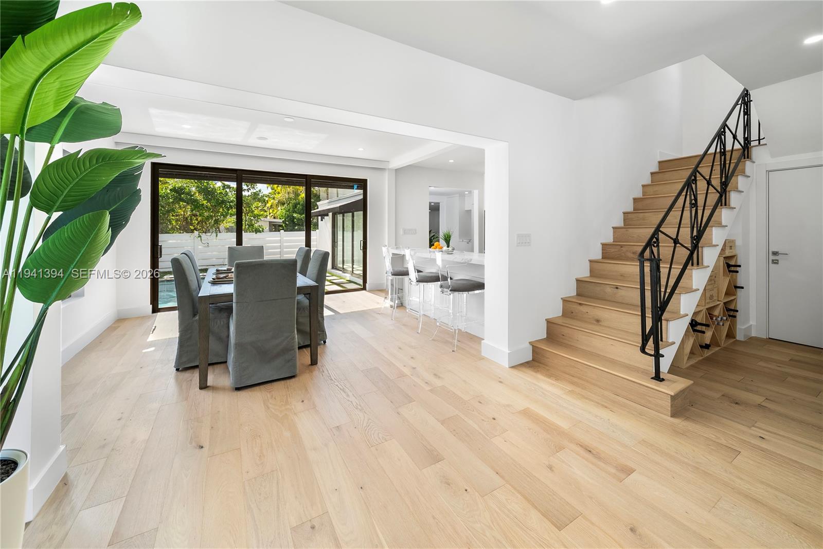 600 Northeast 57th Street Miami, FL 33137 - Photo 13 of 43 a living room with furniture a large window with outer view