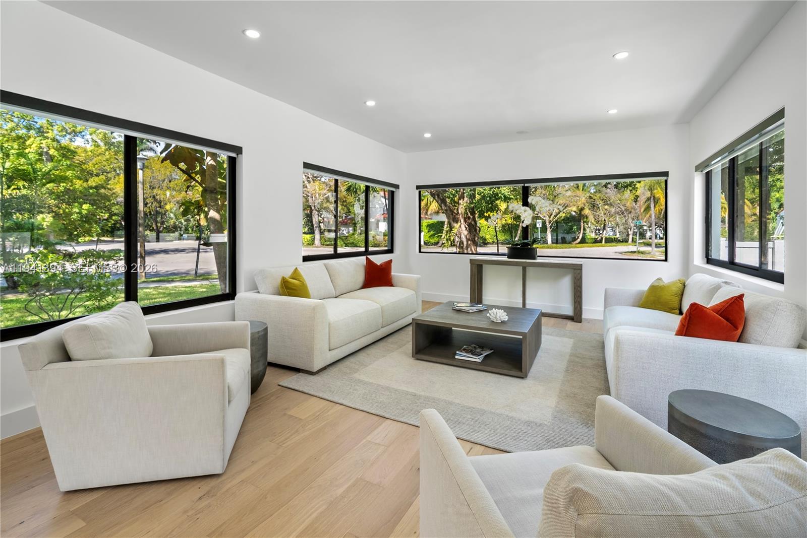 600 Northeast 57th Street Miami, FL 33137 - Photo 15 of 43 a living room with furniture and a large window