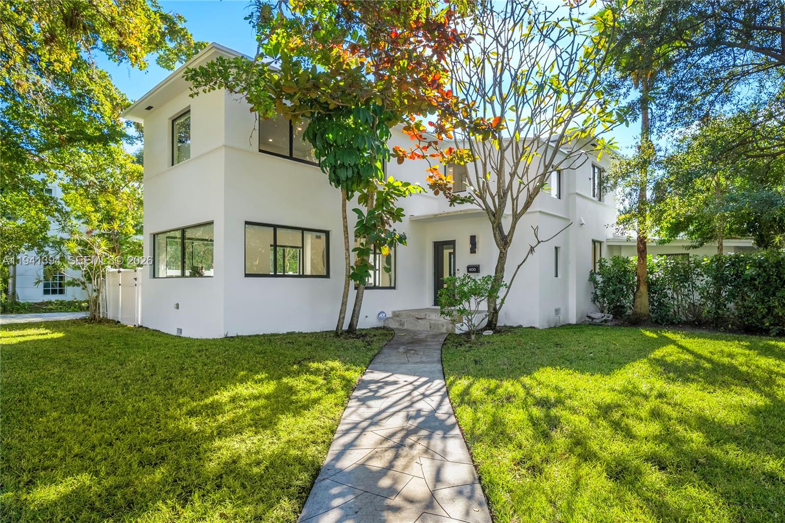 600 Northeast 57th Street Miami, FL 33137 - Photo 3 of 43 a view of a house with a yard
