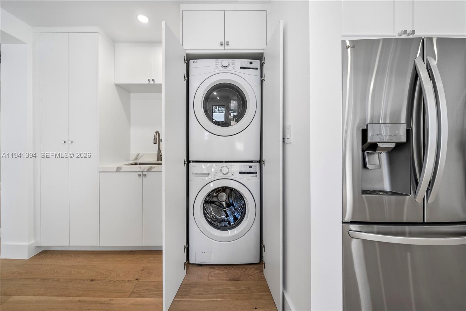 600 Northeast 57th Street Miami, FL 33137 - Photo 33 of 43 a utility room with dryer and washer