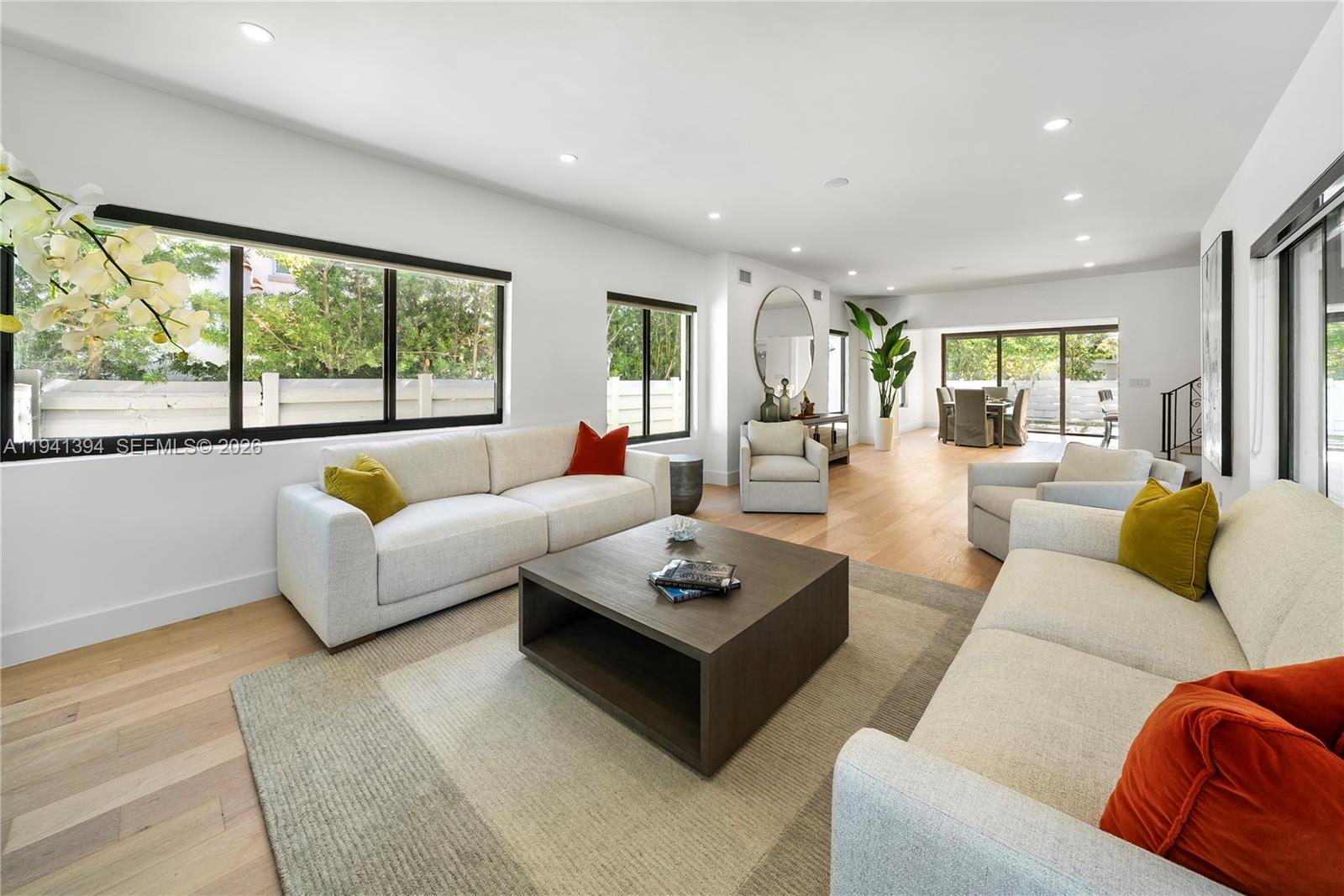 600 Northeast 57th Street Miami, FL 33137 - Photo 4 of 43 a living room with furniture and a large window