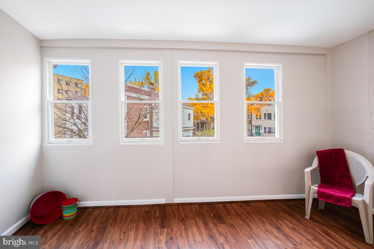 1526 Spring Place Northwest Washington, DC 20010 - Photo 21 of 35 a hallway with a wooden floor