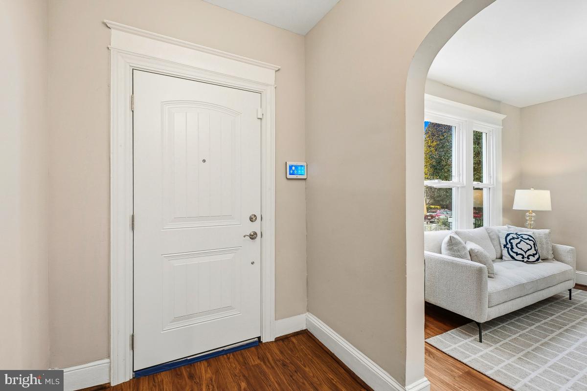 1526 Spring Place Northwest Washington, DC 20010 - Photo 6 of 35 a bedroom with bed and wooden floor