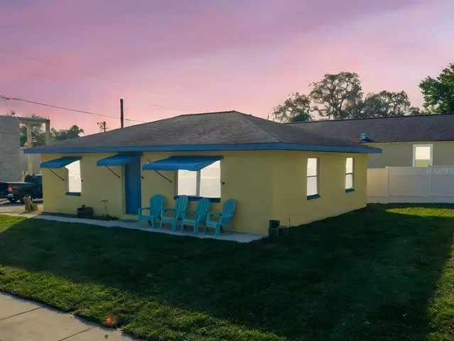 a front view of house with garden