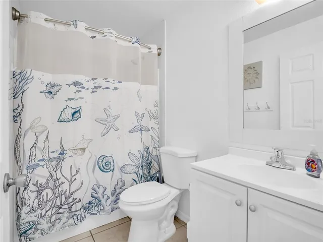 a bathroom with a sink and toilet