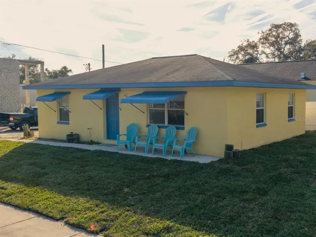 a view of a backyard with a garden