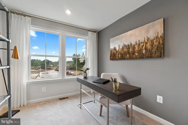 a room with furniture and a window