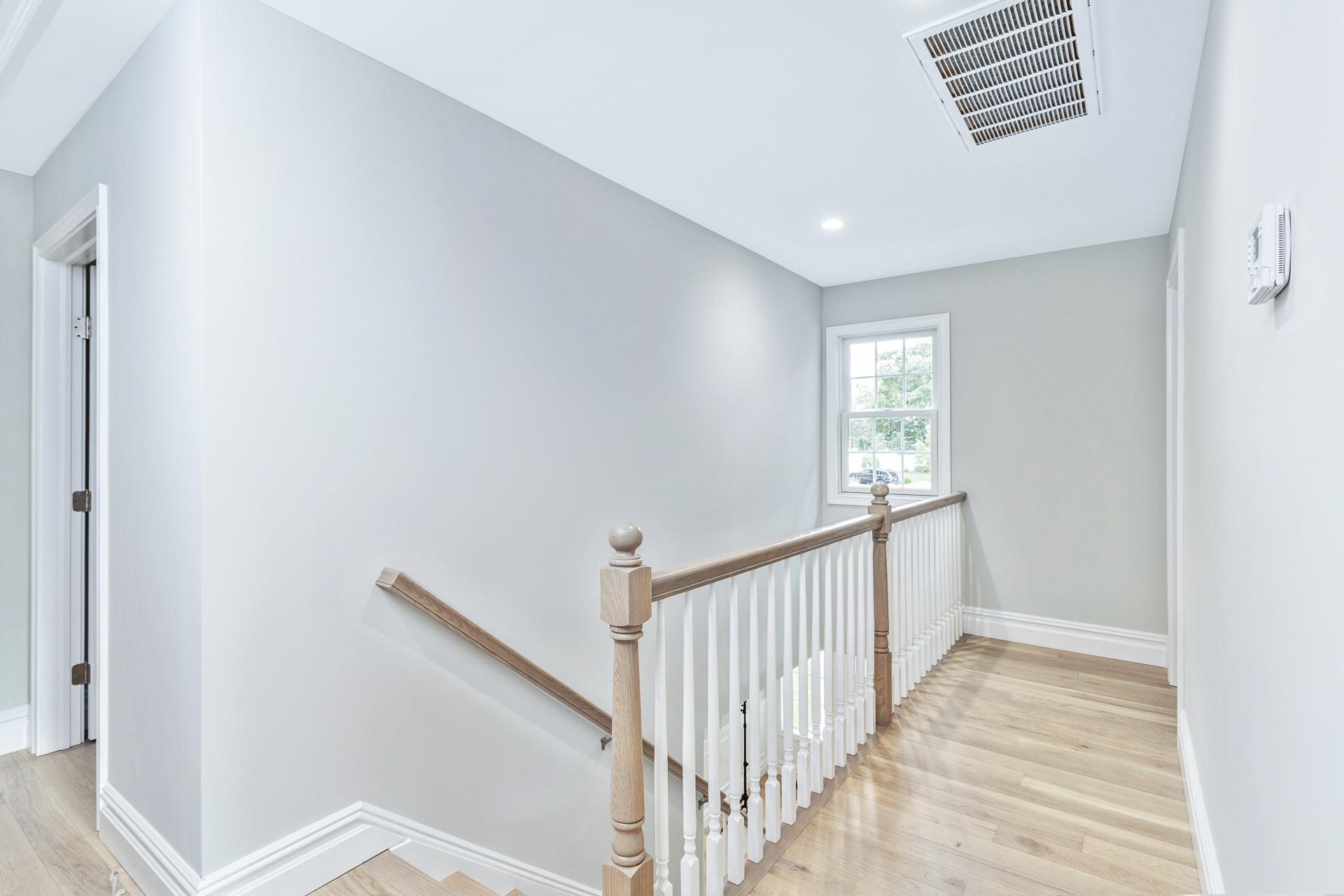 223 Town Line Road Commack, NY 11731 - Photo 24 of 32 a view of a hallway with window
