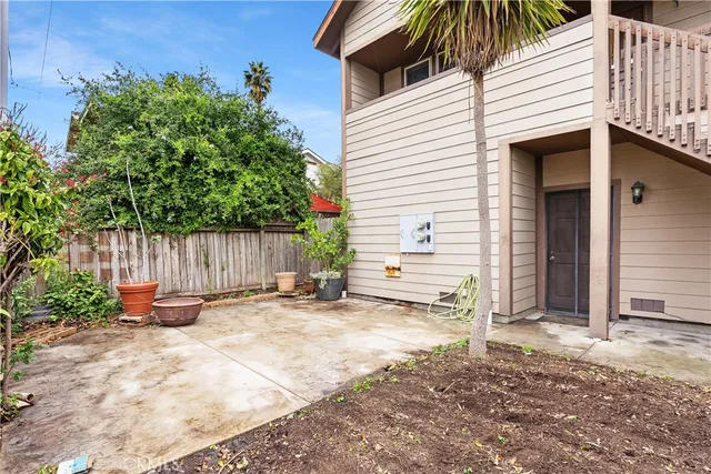 a backyard of a house with seating space