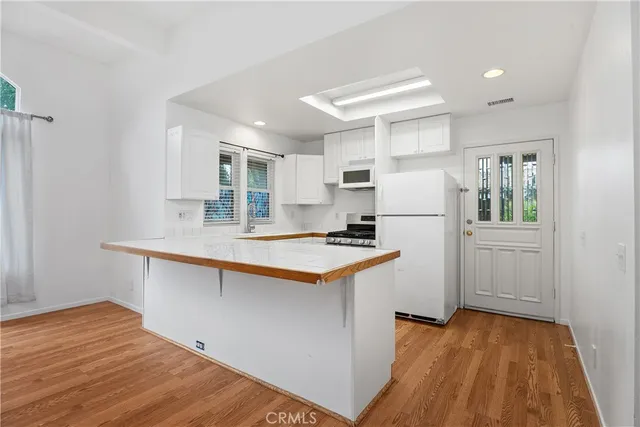 a bathroom with a sink and a window
