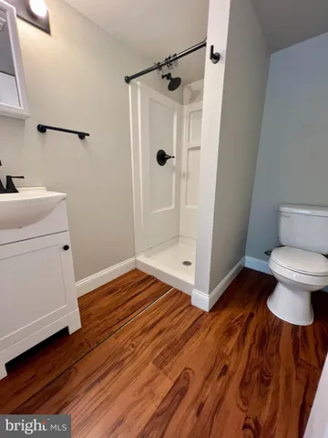 a bathroom with a sink and a toilet