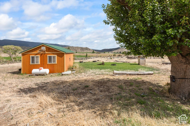 1054 East Jakes Pl Road Fremont, UT 84747 - Photo 4 of 18 View of yard with a mountain view and a view of rural / pastoral area