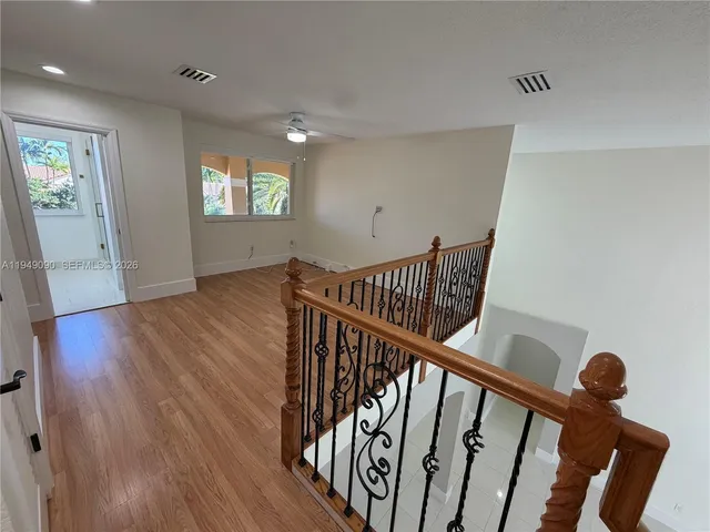 a bathroom with a sink double vanity granite tub and shower