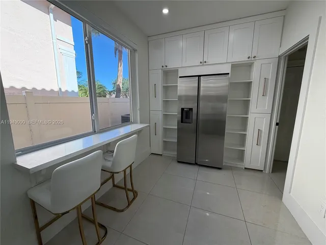 a kitchen with a sink and a window