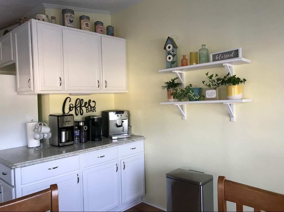 60 Cherry Lane Bourbonnais, IL 60914 - Photo 12 of 13 a kitchen with a cabinets and window