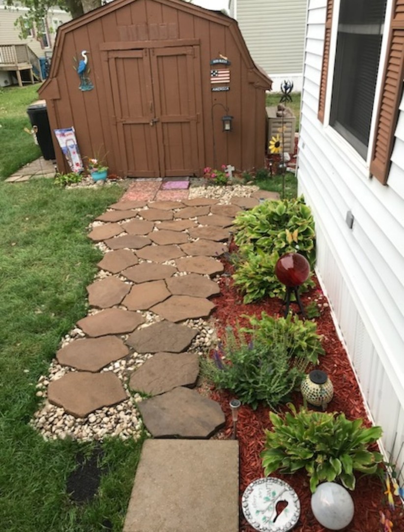 60 Cherry Lane Bourbonnais, IL 60914 - Photo 6 of 13 a backyard of a house with lots of green space