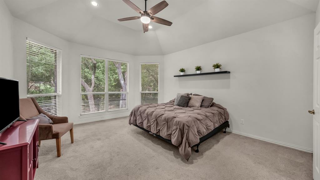 203 Mockingbird Lane Aledo, TX 76008 - Photo 22 of 37 Carpeted room featuring a vaulted ceiling with recessed lighting and a ceiling fan