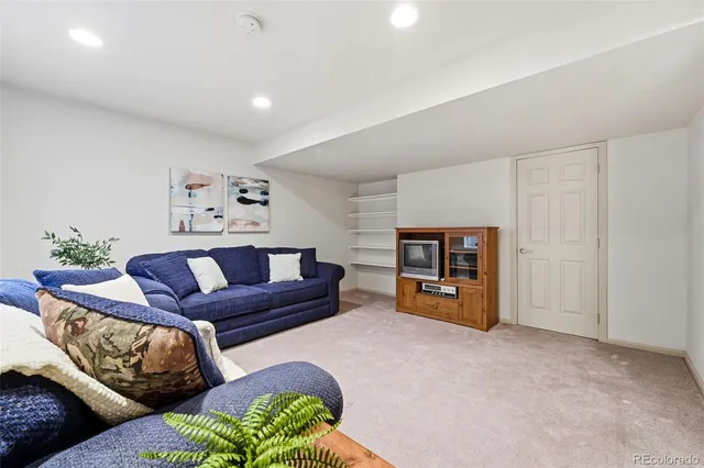 a living room with furniture and a couch