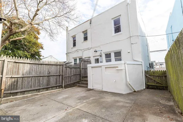 a view of a house with a street