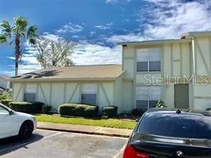a car parked in front of a house